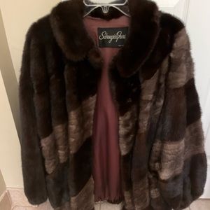 Woman’s brown/light brown real fur coat. Long sleep inside hook and eye closure